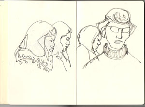 Ink drawing of people in a sketchbook